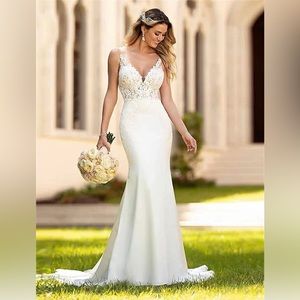 Beautiful handmade wedding dress- NEVER WORN BNWT. Absolutely stunning.